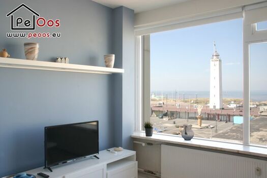 Wohnzimmer mit Aussicht und TV
