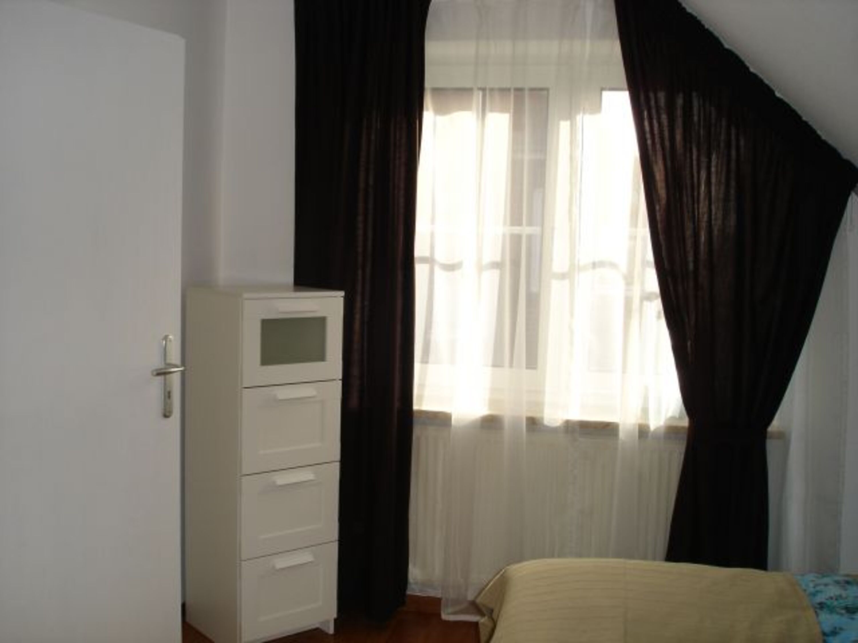 Schlafzimmer mit Doppelbett