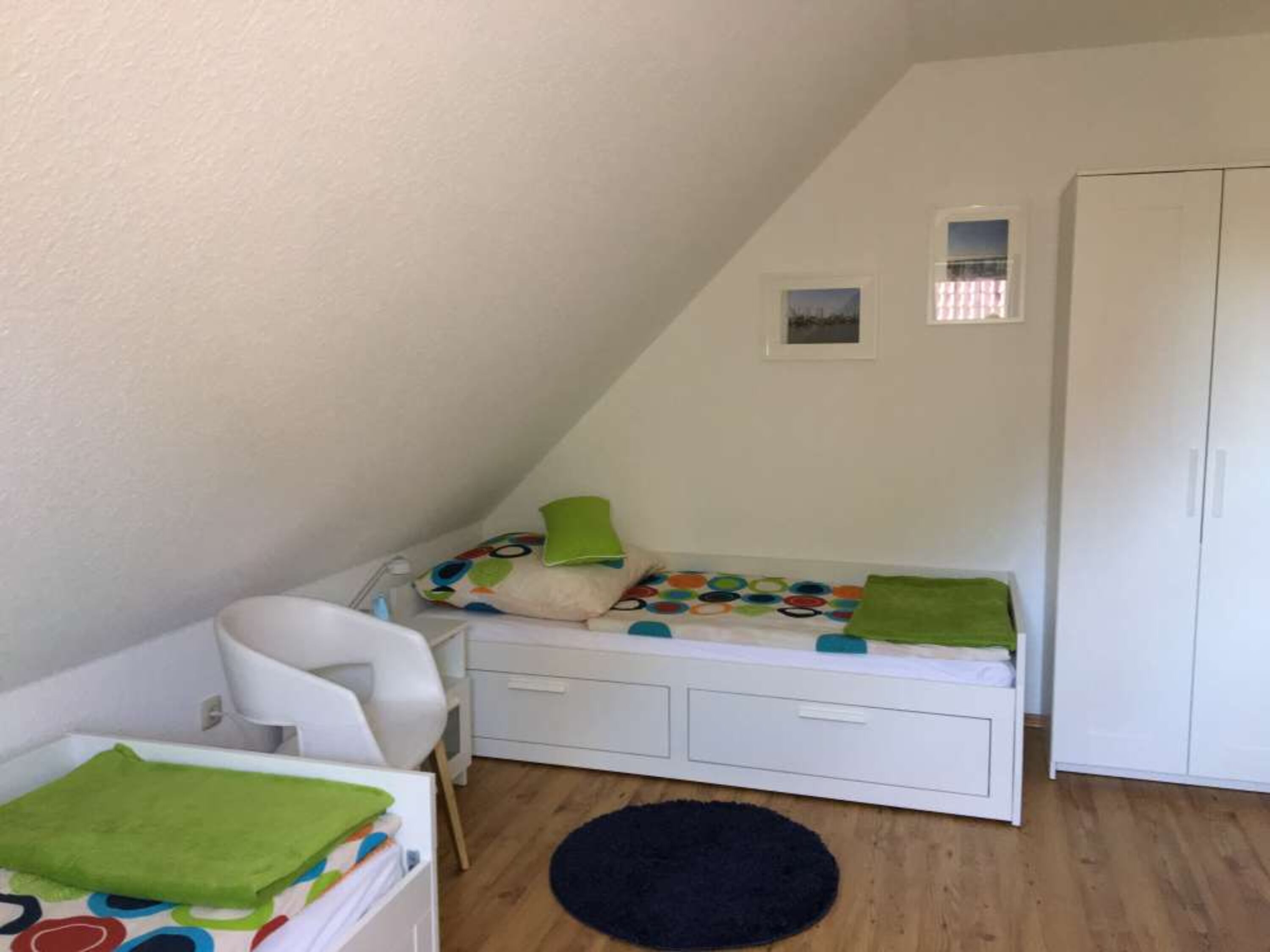Schlafzimmer mit 2 Einzelbetten