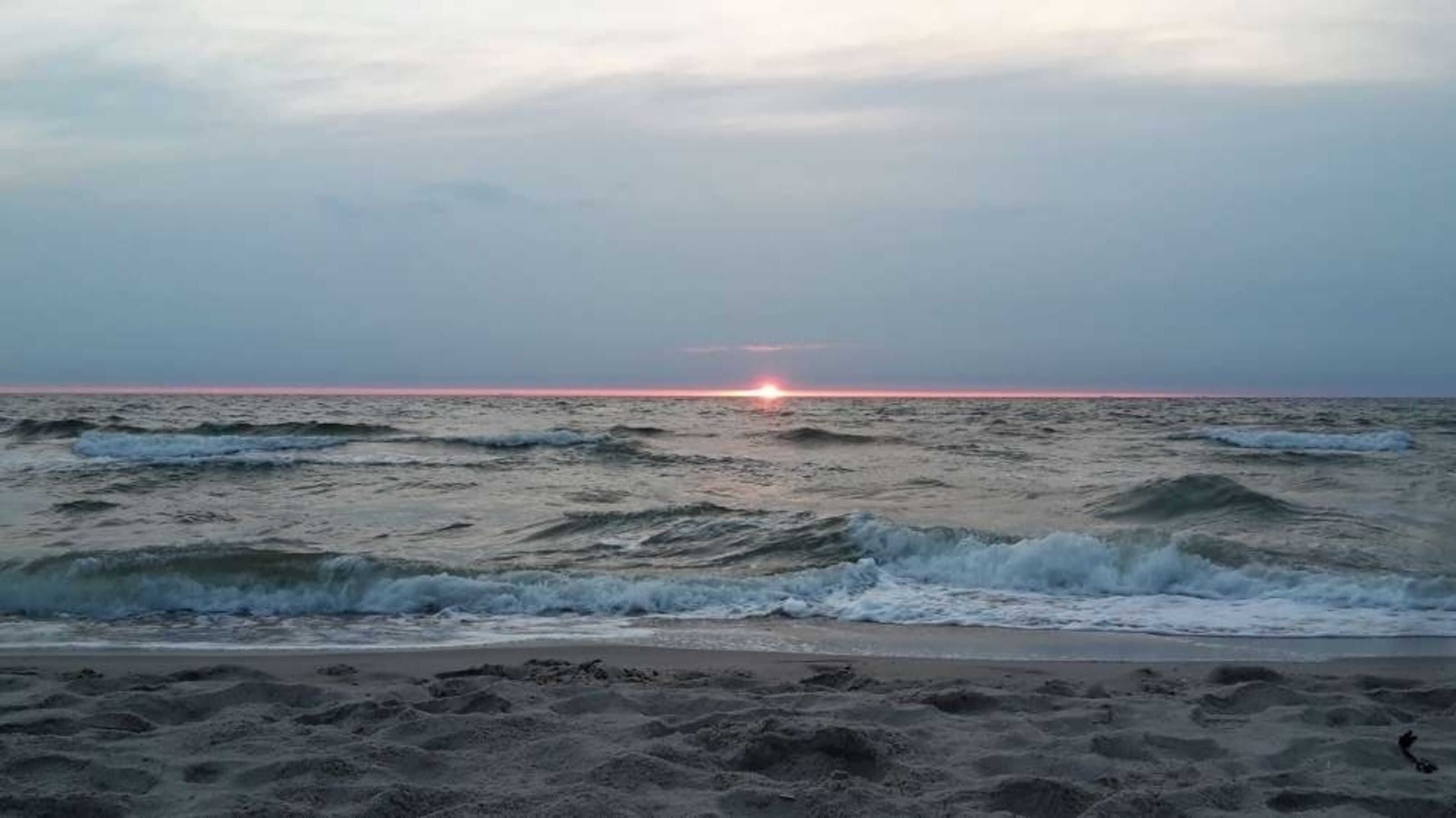 Weststrand mit Sonnenuntergang
