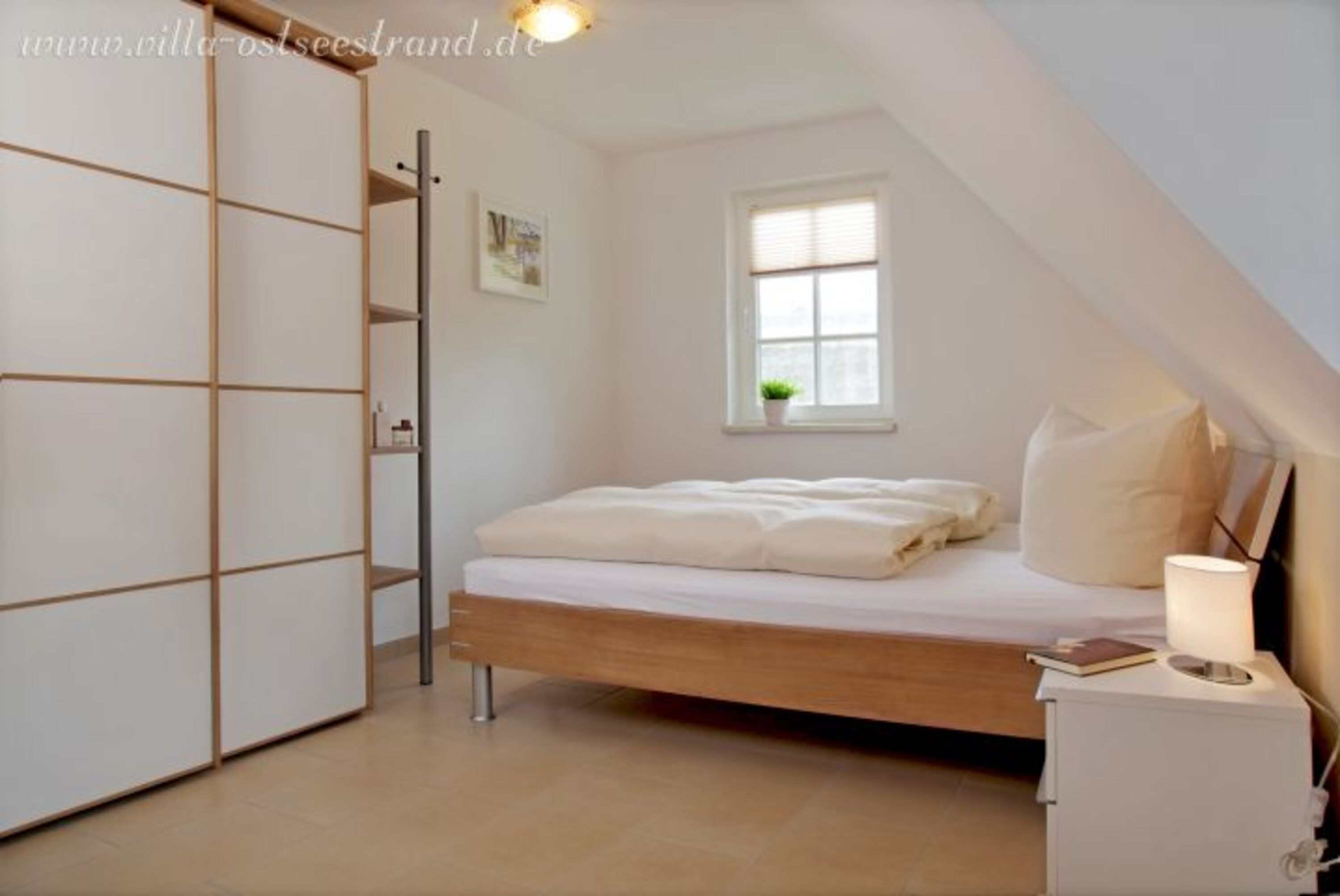 1. Schlafzimmer mit Doppelbett im OG