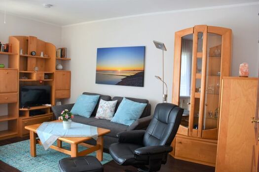 Wohnzimmer mit Schlafsofa