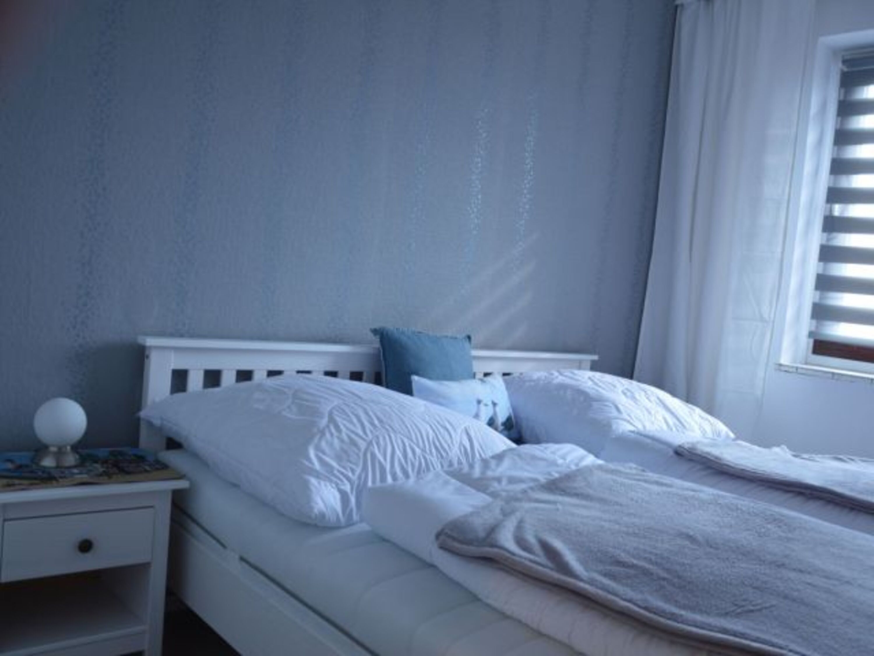 Schlafzimmer mit Doppelbett