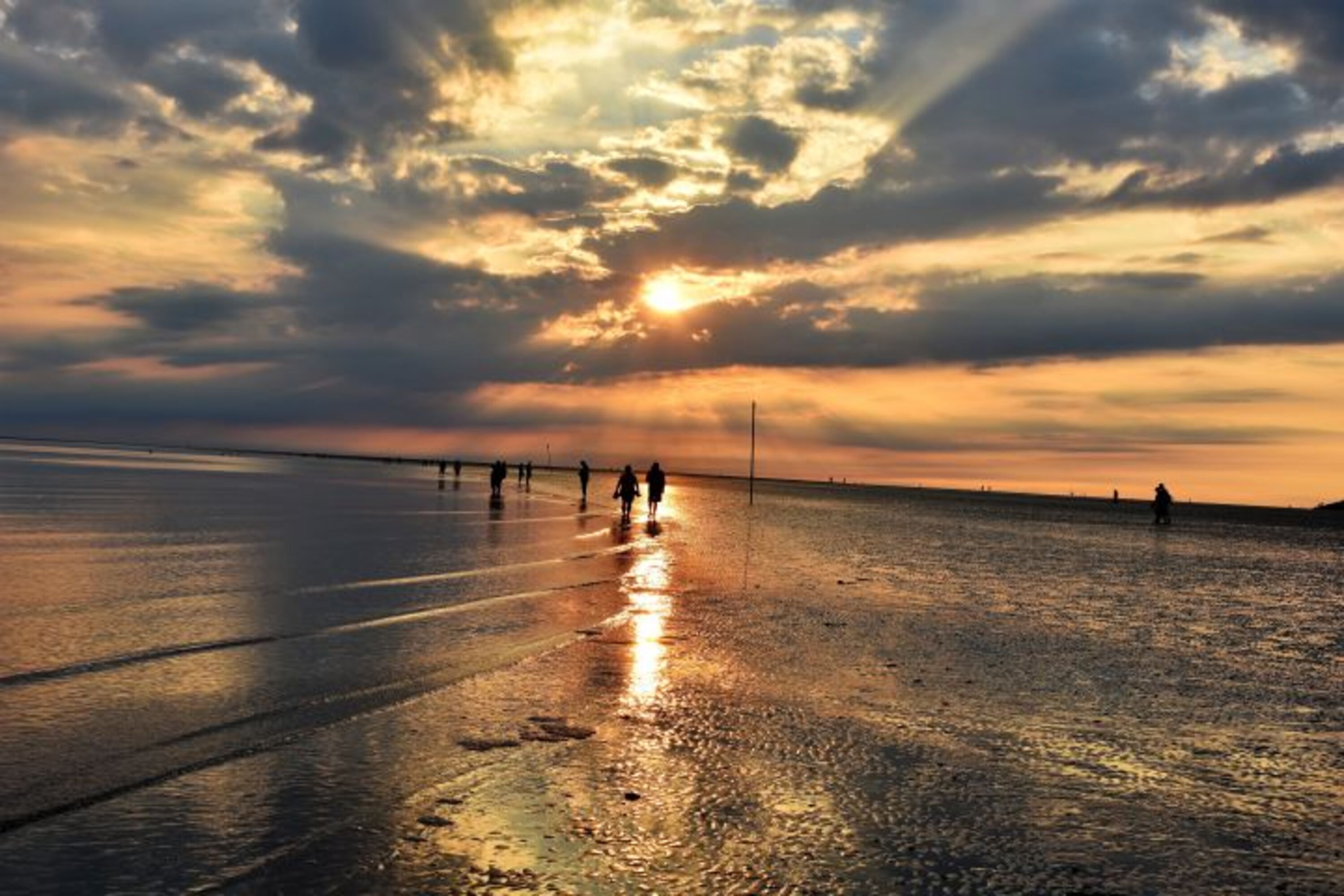 Wattlaufen in den Sonnenuntergang