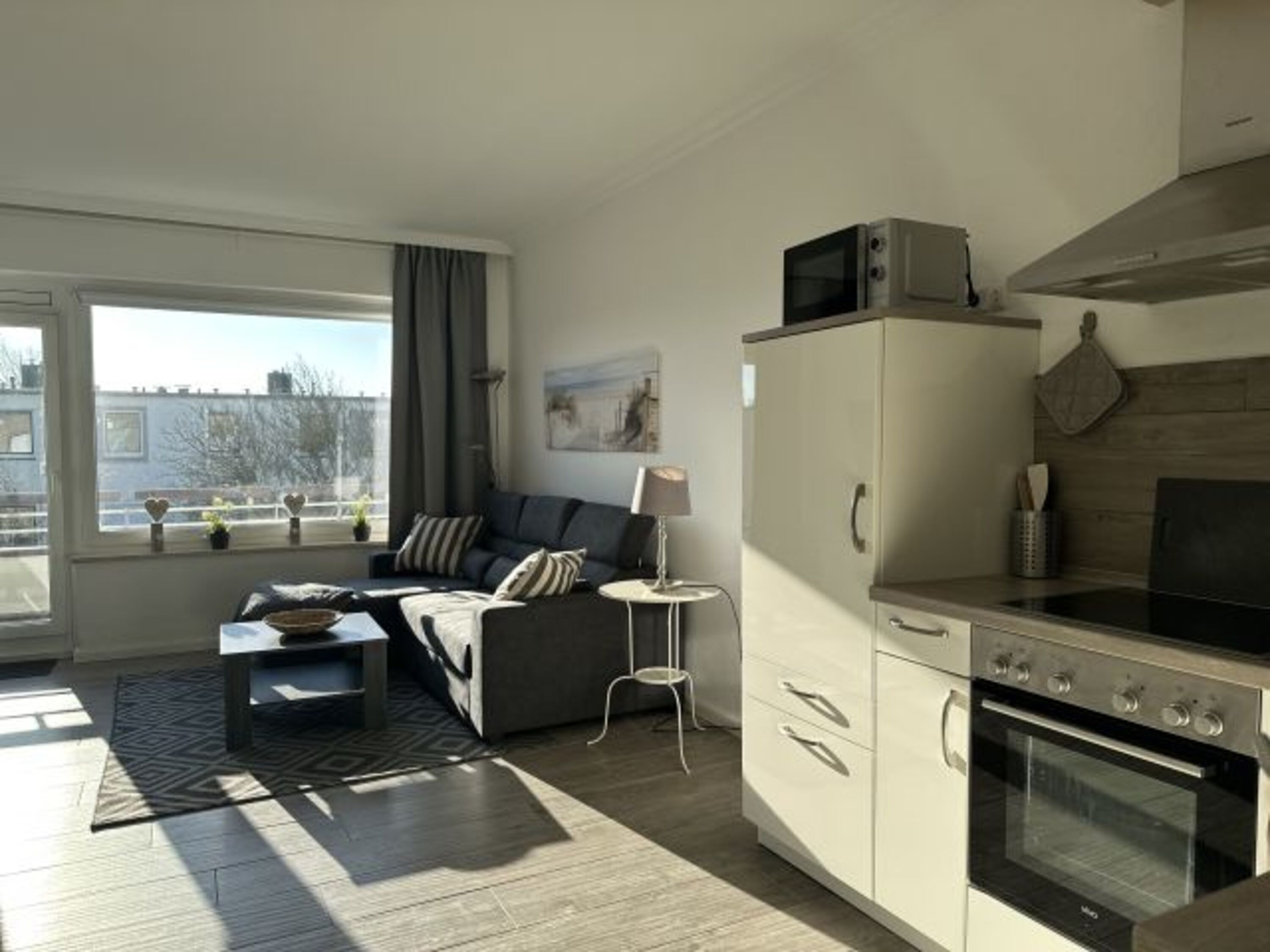 Wohnzimmer mit Küche