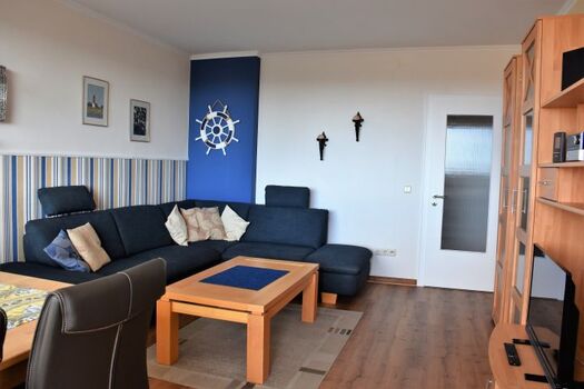 Wohnzimmer mit Schlafsofa