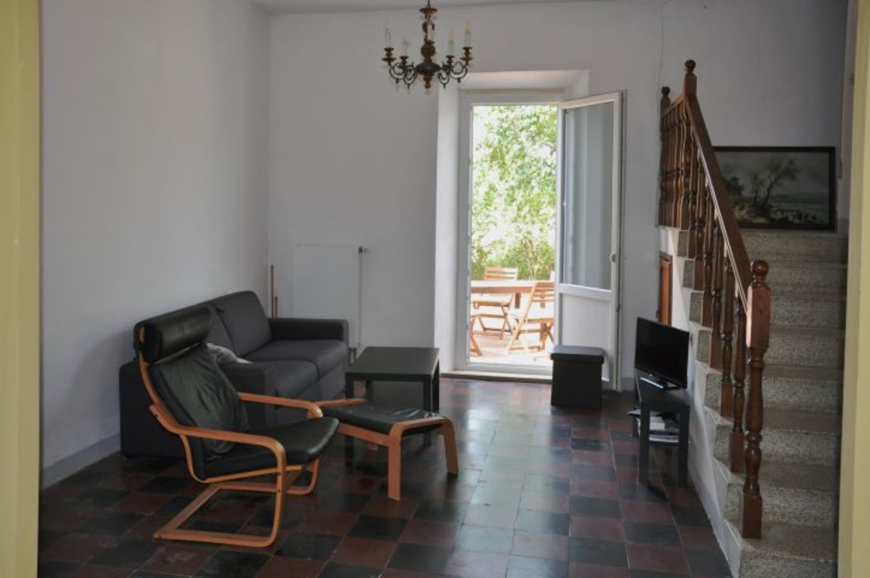 Wohnzimmer mit Ausgang zur Terrasse