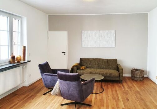 Wohnecke mit Sofa und 2 Sessel
