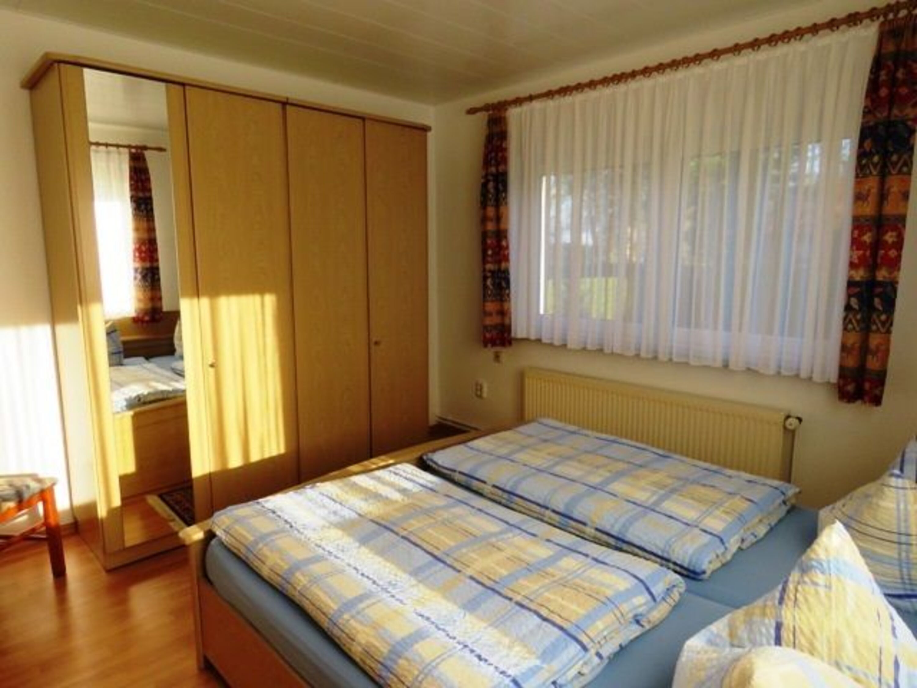 Schlafzimmer 1 mit einem Doppelbett