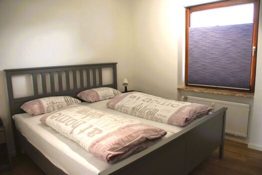 Schlafzimmer mit Doppelbett