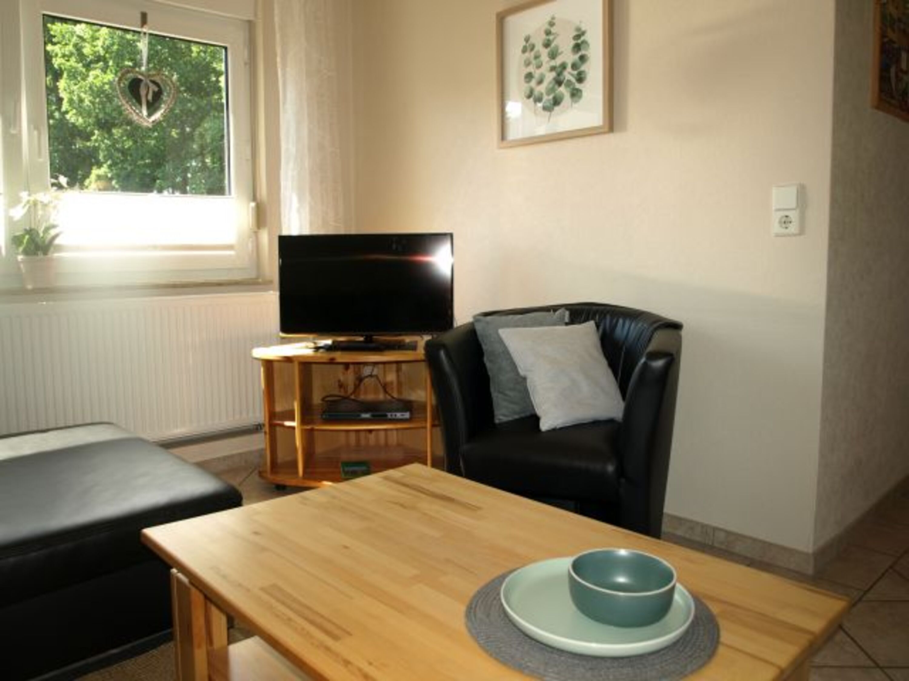 Wohnzimmer mit Fernseher