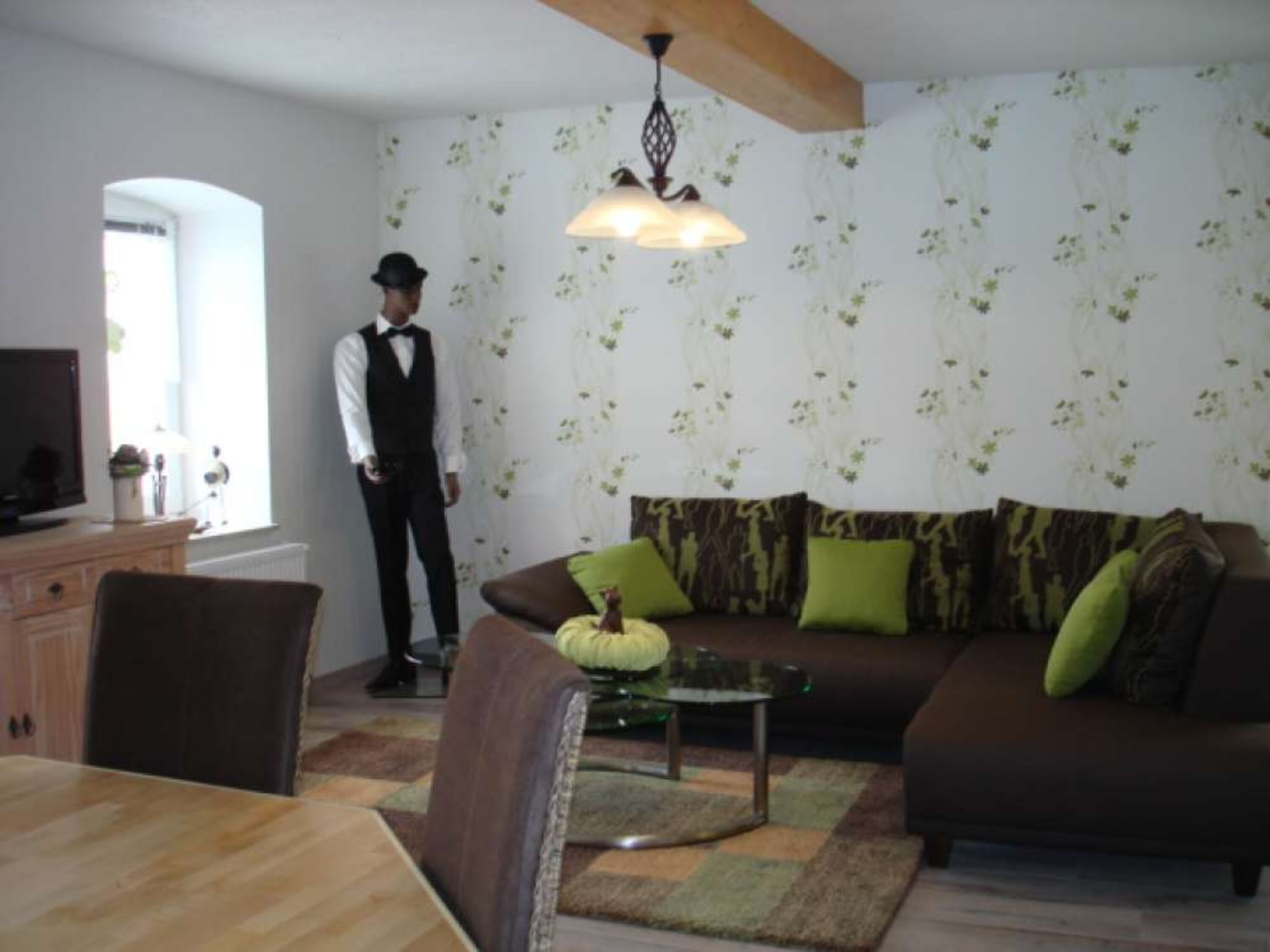 Wohn.Esszimmer mit Sitzecke im Ferienhaus.