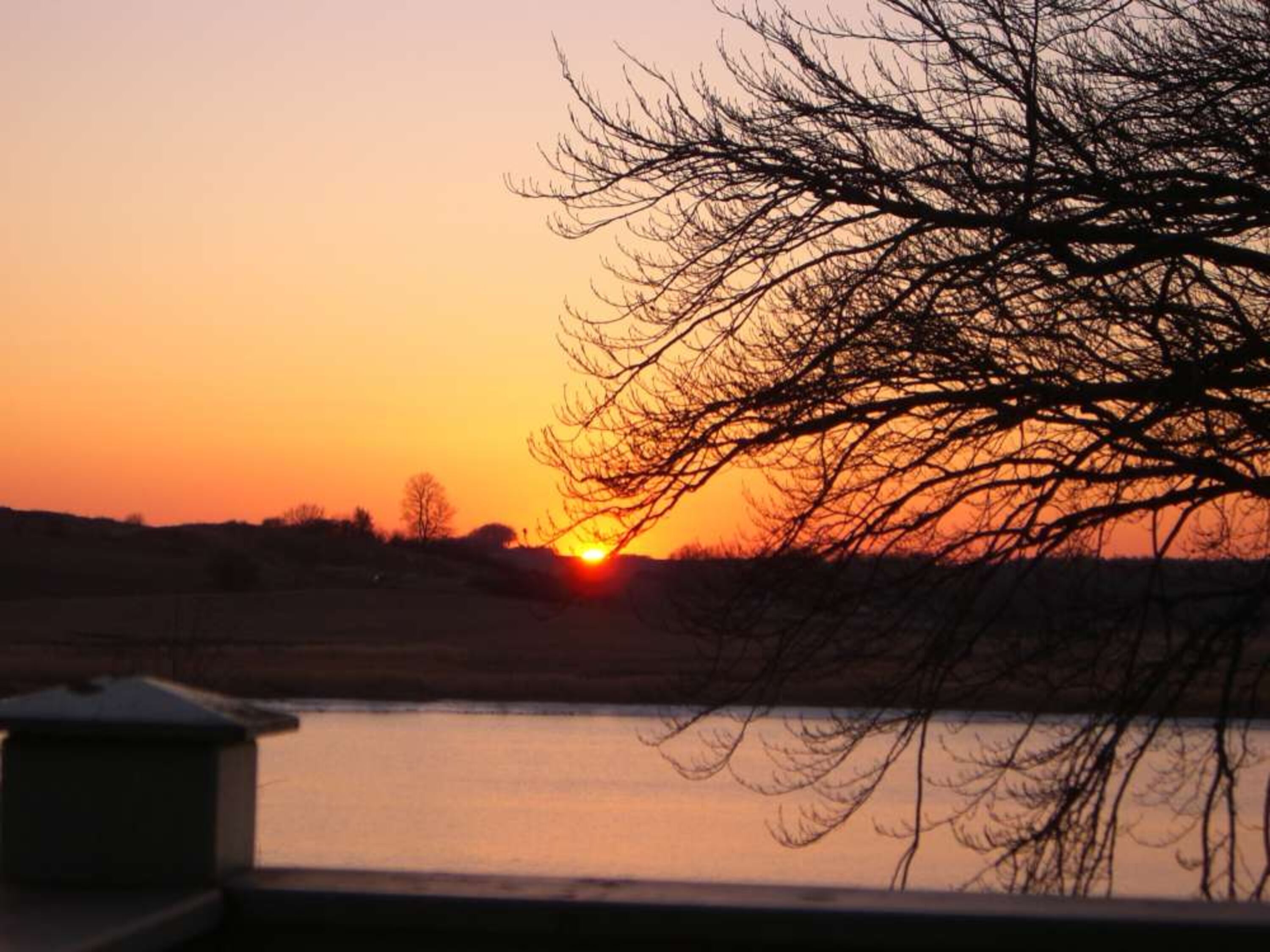 Blick vom Westbalkon auf den Sonnenuntergang
