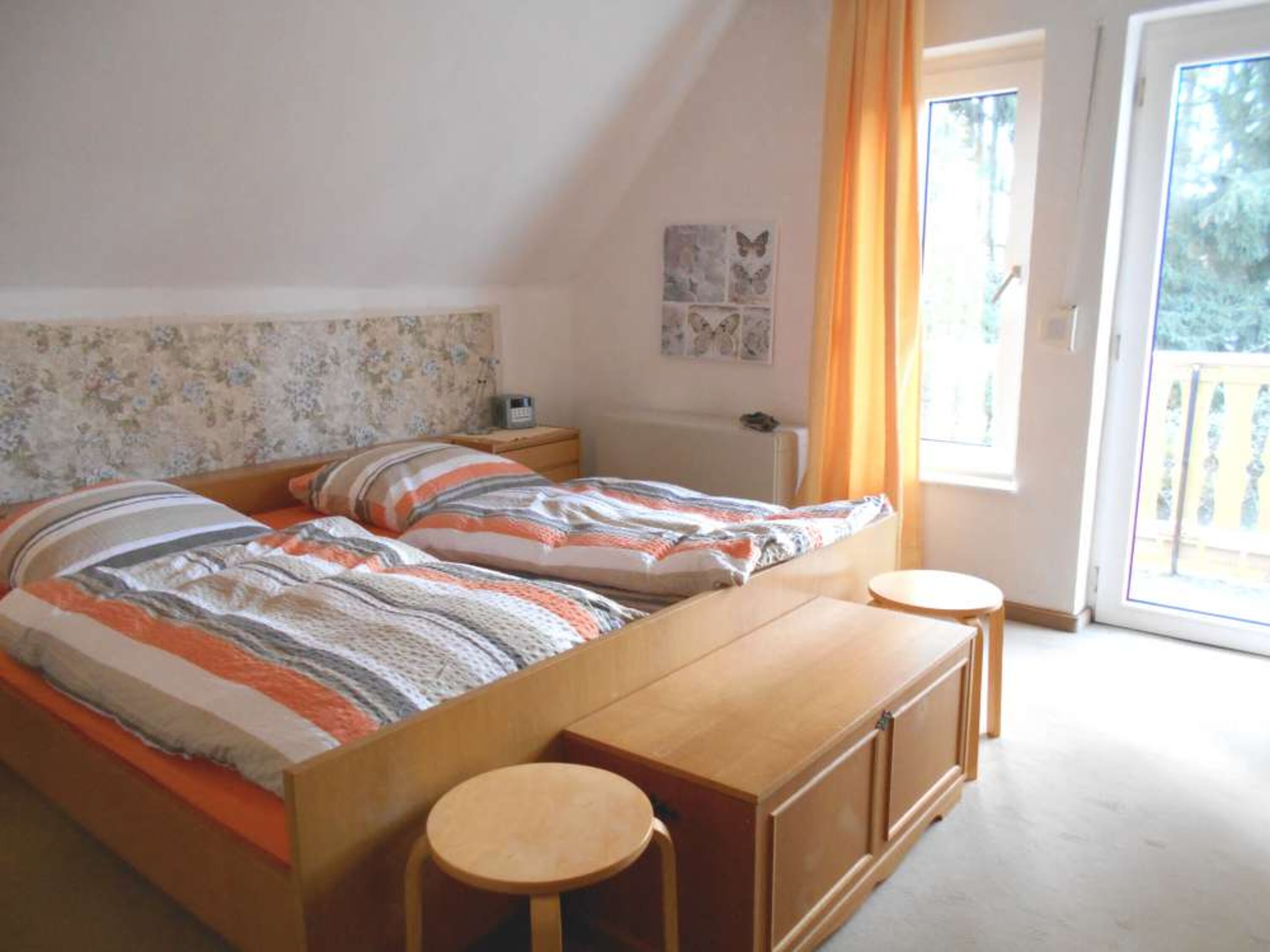 Schlafzimmer mit Balkon