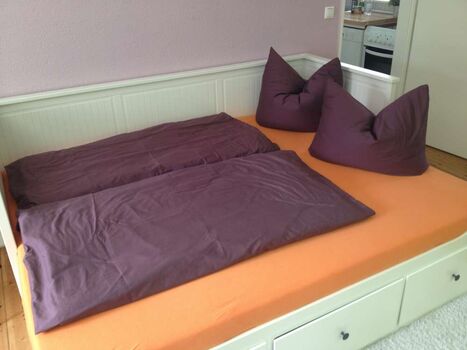 Das Bett im Schlafzimmer